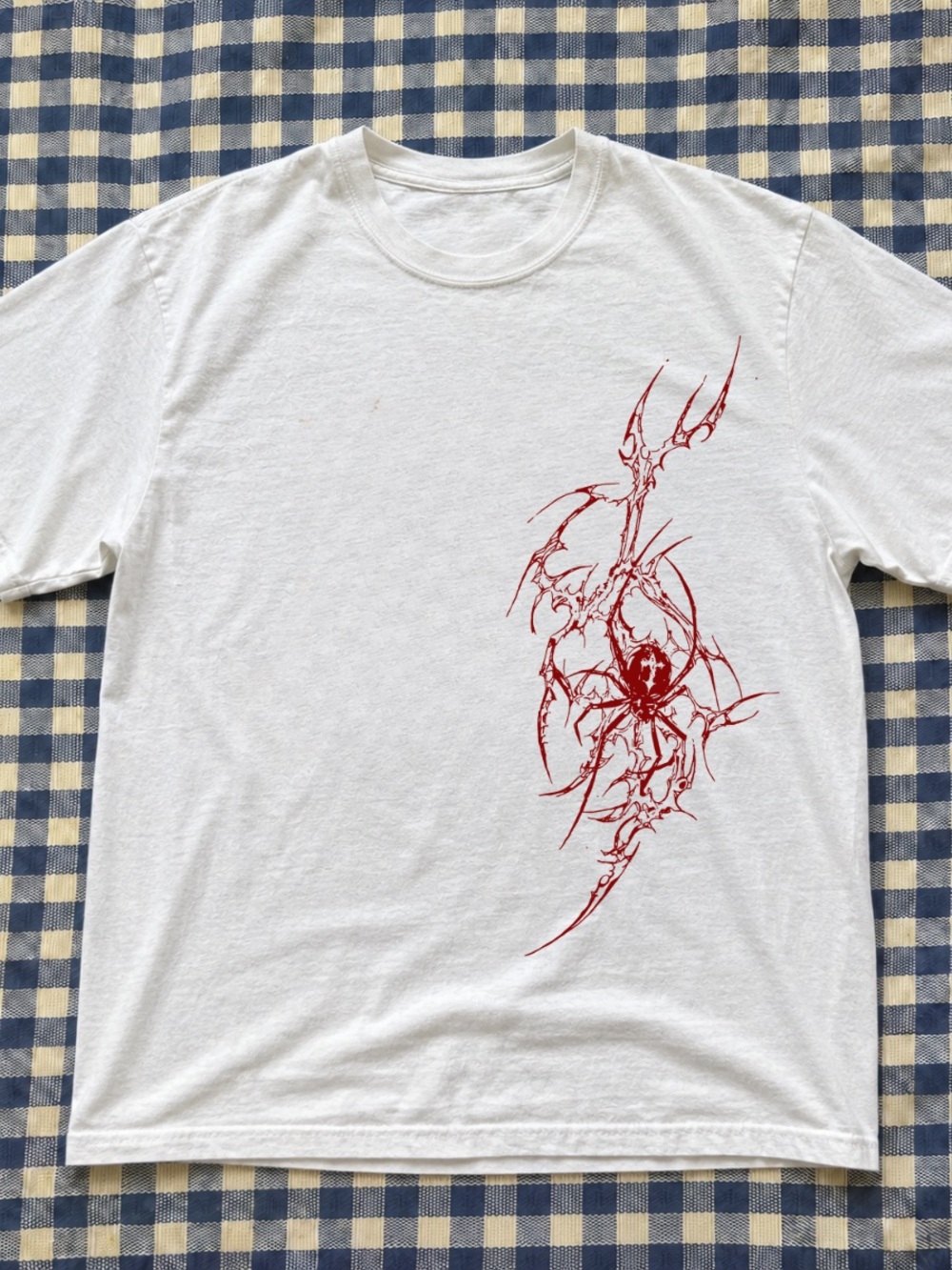 Retro Men's White Graphic Tee with Red Tribal Artwork